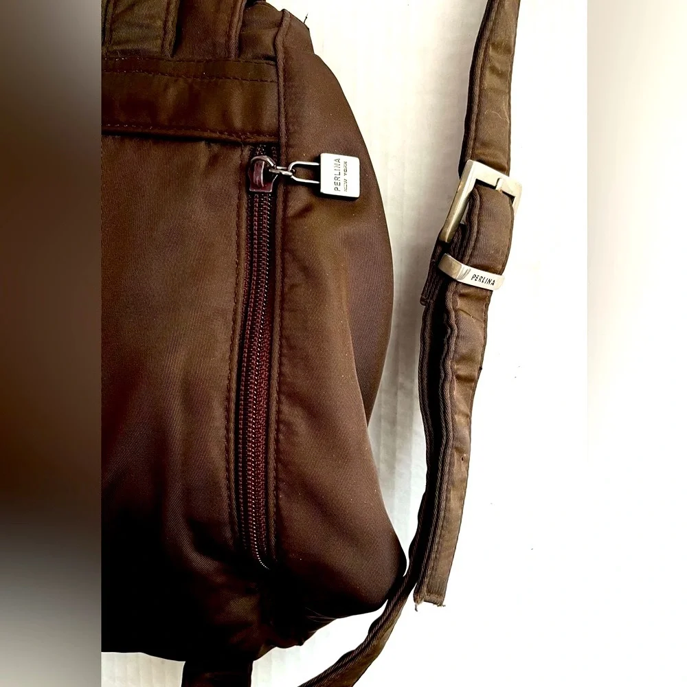 Perlina New York Brown Nylon Mini Backpack. Leather Accents, Storage Pockets
